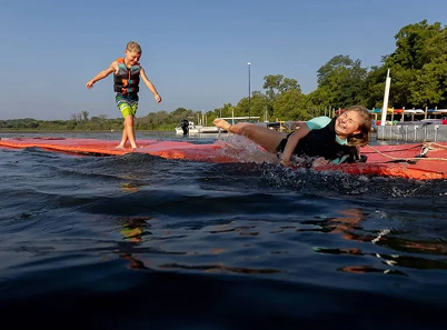 Kids playing on paddleboards 